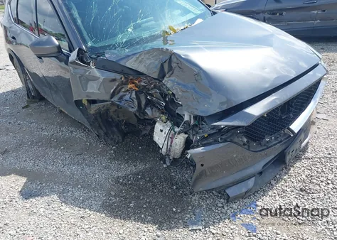 2019 Mazda Cx-5 Signature z USA, uszkodzony, nr VIN JM3KFBEY3K0630493